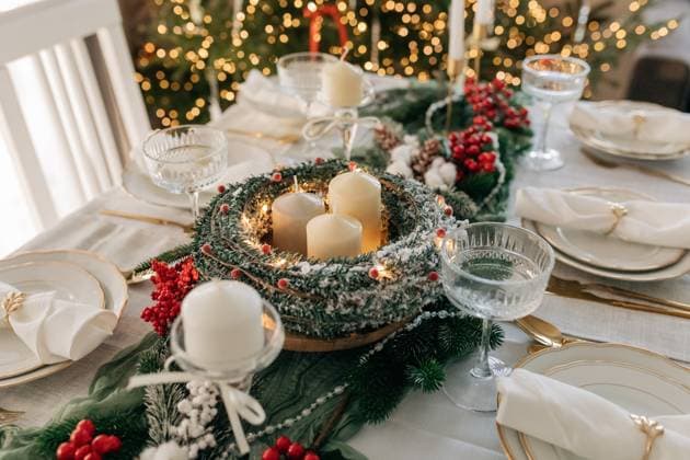 Elegant Christmas table setting with candle centerpiece and festive decor, NASF00021