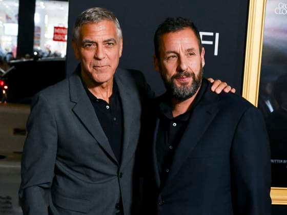 October 23, 2025, Hollywood, California, USA: American actor, filmmaker, activist, and humanitarian GEORGE CLOONEY and American actor and comedian ADAM SANDLER attend AFI FEST Presented By Red Carpet Premiere of Jay Kelly Hollywood USA - ZUMAb173 20251023_aap_b173_001 Copyright: xBillyxBennightx