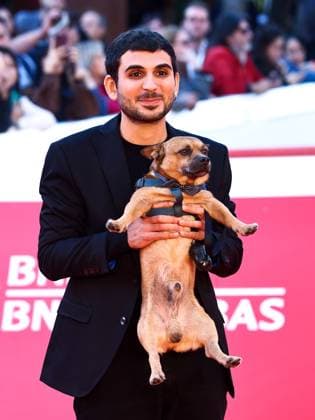 Rome: Rome Cinema Fest 2025, evening 11 - Red Carpet for the film Tienimi Presente. Pictured: Alberto Palmiero with his dog Jonny. Rome  - ZUMAp169 20251024_zea_p169_694 Copyright: xMarcoxProvvisionatox