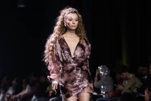 ARMENIA, YEREVAN - OCTOBER 25, 2025: A woman models creations during a runway show for THE WSHOP as part of Yerevan Fashion Week 2025 at the Meridian Expo and Event Centre. Alexander Patrin TASS  85148117
