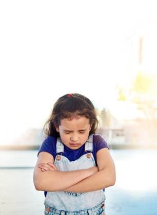 Sad, young girl and arms crossed for depression, anger and mental health indoor at home with lens flare. Upset, female child and frustrated or mad from overstimulation with autism or adhd at house Sad, young girl and arms crossed for depression, anger and mental health indoor at home with lens flare. Upset, female child and frustrated or mad from overstimulation with autism or adhd at house., model released, , 59422598.jpg RECORD DATE NOT STATED