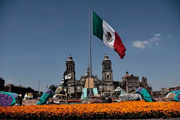 October 25, 2025, Mexico, Cdmx, Mexico: In honor of the Day of the Dead celebrations throughout Mexico, the city government opened the doors to thousands of visitors to appreciate the 2025 Day of the Dead Monumental Offering in the Plaza de la Constitucio³n. This installation of alebrijes and cartoneroÂa (paper carvings) was subject to voting; various projects competed, but the winning artists, who were in charge of the installation and assembly, were the ZION ART STUDIO COLLECTIVE. They created a representation of the pilgrimage of the inhabitants of the mythical Aztlan to Mexico Cityâ€Tenochtitlan. The pieces stand out for their size and for depicting the jaguar, the axolotl, the Xoloitzcuintle dog, the Red Queen, among other en - ZUMAp204 20251025_zip_p204_032 Copyright: xJosuexPerezx