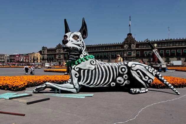October 25, 2025, Mexico, Cdmx, Mexico: In honor of the Day of the Dead celebrations throughout Mexico, the city government opened the doors to thousands of visitors to appreciate the 2025 Day of the Dead Monumental Offering in the Plaza de la Constitucio³n. This installation of alebrijes and cartoneroÂa (paper carvings) was subject to voting; various projects competed, but the winning artists, who were in charge of the installation and assembly, were the ZION ART STUDIO COLLECTIVE. They created a representation of the pilgrimage of the inhabitants of the mythical Aztlan to Mexico Cityâ€Tenochtitlan. The pieces stand out for their size and for depicting the jaguar, the axolotl, the Xoloitzcuintle dog, the Red Queen, among other en - ZUMAp204 20251025_zip_p204_014 Copyright: xJosuexPerezx