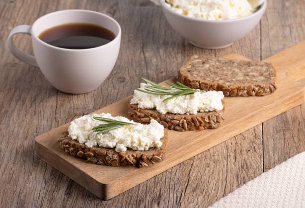 Homemade rye bread with cottage cheese in a plate and coffee. Healthy breakfast concept Homemade rye bread with cottage cheese in a plate and coffee. Healthy breakfast concept..., 59323340.jpg RECORD DATE NOT STATED