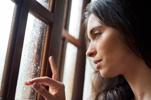 Thinking, lonely and woman in window by rain, winter weather and water with drops for gloomy atmosphere. Home, sad and female person with seasonal affective disorder, low energy and climate change Thinking, lonely and woman in window by rain, winter weather and water with drops for gloomy atmosphere. Home, sad and female person with seasonal affective disorder, low energy and climate change., model released, , 60957134.jpg RECORD DATE NOT STATED