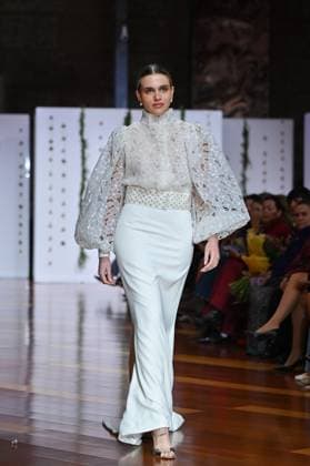 October 28, 2025, Madrid, Spain: A model showcases creations by Carmen Alba during the Atelier Couture bridal catwalk within Madrid Fashion Week, at Fabrica de Tapices in Madrid. Madrid Spain - ZUMAs197 20251028_aaa_s197_161 Copyright: xAtilanoxGarciax