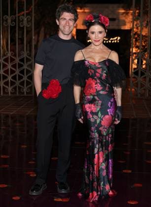 Max Greenfield and Tess Sanchez attend the 2025 Dia De Muertos Gala Presented by Lexus, Tequila Don Julio, Nike, DNERO, Calamigos Ranch and Maremoto at the Los?Angeles? River?Center?&?Gardens in Los Angeles on Thursday, October 30, 2025.  LAP20251030094 GREGxGRUDT