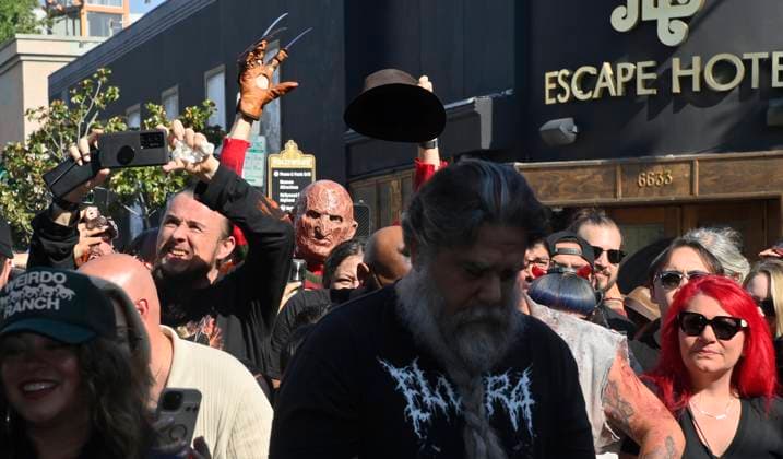 A man dressed as the Freddy Krueger joins hundreds of fans during an unveiling ceremony honoring American actor and director Robert Englund, who is best known for his portrayal of the villainous Freddie Krueger, with the 2, 826th star on the Hollywood Walk of Fame in Los Angeles on Friday, October 31, 2025.  LAP2025103137 JIMxRUYMEN