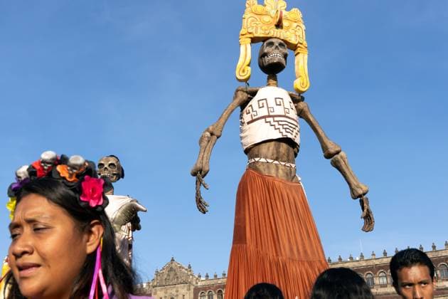 Day Of The Dead In Mexico City s Historic Center People attend a Day of the Dead celebration in the Zocalo, the historic center of Mexico City, Mexico. Day of the Dead honors deceased loved ones with altars, marigolds, skull face paint, and offerings meant to guide returning spirits. The Zocalo, officially Plaza de la Constitucion, is Mexico City s main square and serves as the political and cultural heart of the capital since Aztec times. Mexico City Mexico Mexico  Copyright: xRonenxTivonyx originalFilename: tivony-dayofthe251031_npk2O.jpg