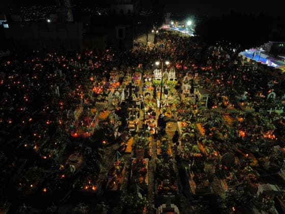 People Visit San Andres Mixquic cemetery on Dia de Muertos Celebration Aerial view of the San Andres Mixquic cemetery, located in Tlahuac, where people accompany their deceased loved ones in the traditional lighting ceremony on the Dia de Muertos celebration. on October 3, 2025 in Mexico City, Mexico. (Photo by Carlos Santiago Eyepix Group) Copyright: xCarlosxSantiagox xEyepixxGroupx CS_03112025_172458
