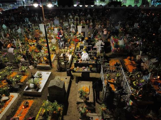 Aerial view of the San Andres Mixquic cemetery, located in Tlahuac, where people accompany their deceased loved ones in the traditional lighting ceremony on the Dia de Muertos celebration. on October 3, 2025 in Mexico City, Mexico. Mexico City Mexico - ZUMAe321 20251103_zia_e321_007 Copyright: xCarlosxSantiagox