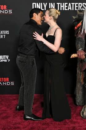 Dimitrius Schuster-Koloamatangi und Elle Fanning bei der Premiere des Kinofilms Predator: Badlands im TCL Chinese Theater. Los Angeles, 03.11.2025