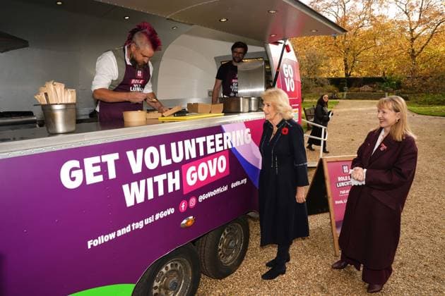 Community volunteering celebration Queen Camilla meets Spudman as he delivers jacket potatoes in a Royal Voluntary Service food truck, as she hosts members of the National Association of Care Catering (NACC), and representatives from Royal Voluntary Service (RVS) in a celebration of community volunteering during Meals on Wheels Week, at Clarence House in central London. Picture date: Wednesday November 5, 2025., Credit:Jordan Pettitt Avalon UK, London  Copyright: xJordanxPettittx xAvalonx 1050498458
