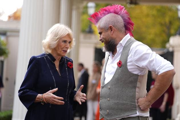 . 05 11 2025. London, United Kingdom. Queen Camilla with social media star ÔSpudmanÕ as she hosts a reception to celebrate community volunteering at Clarence House in London.  xPoolx xi-Imagesx IIM-26355-0015