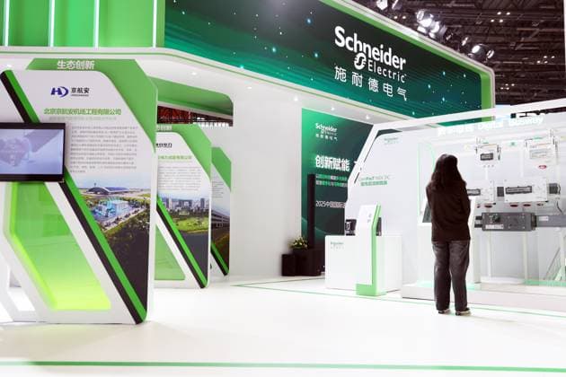 SHANGHAI, CHINA - NOVEMBER 05: People visit the booth of Schneider Electric during the 8th China International Import Expo (CIIE) at the National Exhibition and Convention Center (Shanghai) on November 5, 2025 in Shanghai, China.  Copyright: xChinaxNewsxServicex 111602065267
