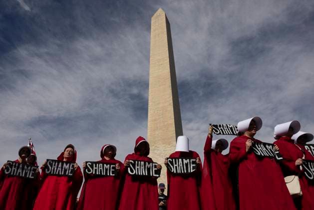 November 5, 2025, Washington, District Of Columbia, United States: People take part in the Ã¢â‚¬oeTrump Must GoÃ¢â‚¬Â protest near the Washington Monument in Washington, D.C., U.S., November 5, 2025. Hundreds rallied at the National Mall on the first anniversary of Donald TrumpÃ¢â‚¬â ¢s re-election to protest his administration and the ongoing government shutdown, the second-longest in U.S. history, which has caused widespread layoffs. Washington United States - ZUMAe119 20251105_znp_e119_018 Copyright: xMehmetxEserx