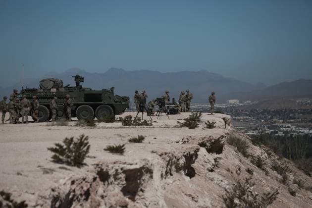 Border Patrol reinforce their security operations near the Jeronimo-Santa Teresa border CIUDAD JUAREZ , MEXICO - NOVEMBER 5: Border Patrol agents assigned to the El Paso sector reinforce their security operations near the Jeronimo-Santa Teresa border area seen from Ciudad Juarez, Mexico on November 5, 2025. Several Stryker armored vehicles, deployed months ago to the U.S. southern border to intensify surveillance at this location. Two helicopters and a large number of soldiers were also present, along with a mobile tower equipped with radar and night-vision cameras. Surveillance operation was intensified on Wednesday due to increase the number of migrants crossing into U.S. territory during supermoon according to CBP. The area was monitored  Copyright: x2025xAnadoluxChristianxTorresx