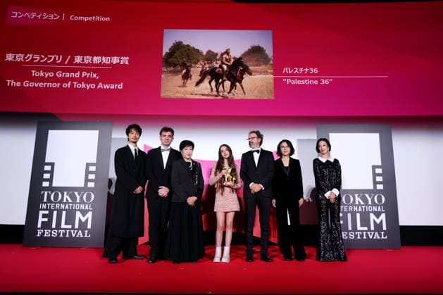 Takumi Saito, Matthieu Laclau, Yuriko Koike, Wardi Eilabouni, Carlo Chatrian, Vivian Qu, Gwey Lun-Mei, November 05, 2025 - Takumi Saito, Matthieu Laclau, Yuriko Koike, Wardi Eilabouni, Carlo Chatrian, Vivian Qu, Gwey Lun-Mei, speak after winning Tokyo Grand Prix The Governor of Tokyo Award for the film Palestine 36 during the 38th Tokyo International Film Festival. award ceremony, in Tokyo, Japan on November 05, 2025.  aflo_309478938