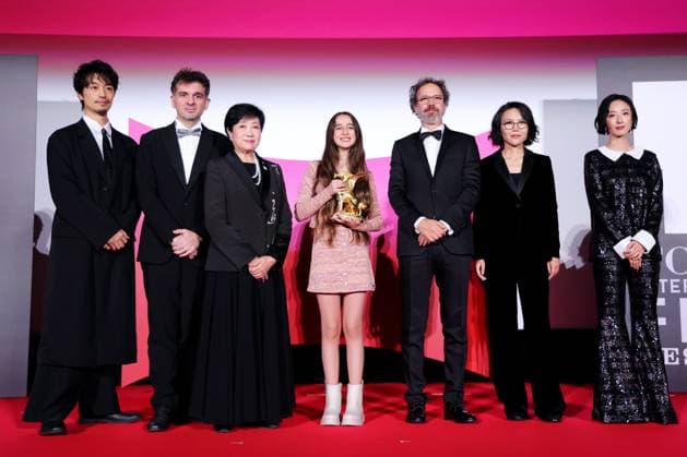 Takumi Saito, Matthieu Laclau, Yuriko Koike, Wardi Eilabouni, Carlo Chatrian, Vivian Qu, Gwey Lun-Mei, November 05, 2025 - Takumi Saito, Matthieu Laclau, Yuriko Koike, Wardi Eilabouni, Carlo Chatrian, Vivian Qu, Gwey Lun-Mei, speak after winning Tokyo Grand Prix The Governor of Tokyo Award for the film Palestine 36 during the 38th Tokyo International Film Festival. award ceremony, in Tokyo, Japan on November 05, 2025.  aflo_309478939