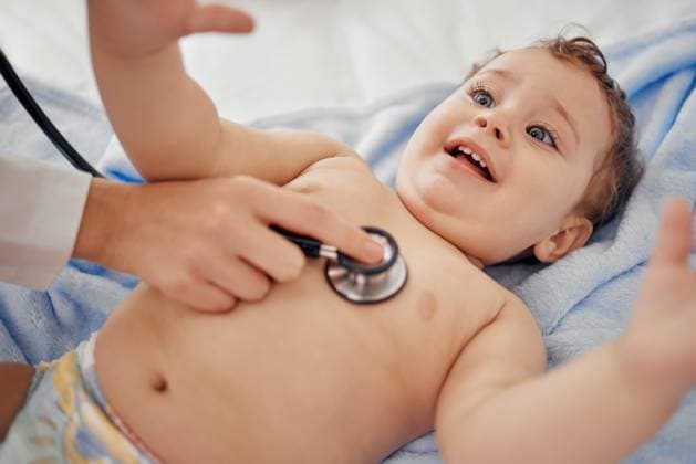 Hands, stethoscope and happy baby in clinic for healthcare, wellness and check heart. Doctor, smile and child for support in hospital for growth, development or cardiology for congenital condition Hands, stethoscope and happy baby in clinic for healthcare, wellness and check heart. Doctor, smile and child for support in hospital for growth, development or cardiology for congenital condition., model released, , property released, , 60747624.jpg RECORD DATE NOT STATED