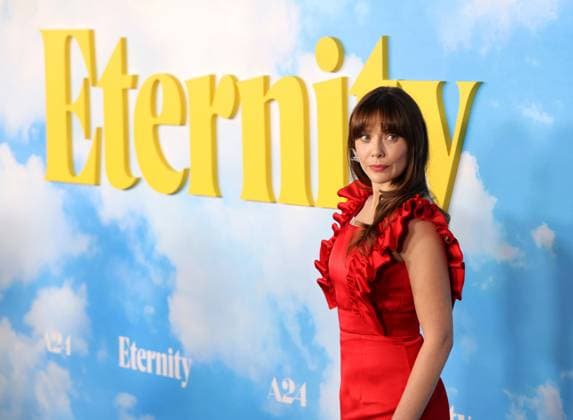 Elizabeth Olsen attends the Los Angeles Special Screening of A24 s Eternity at the AMC Century City 15 in Los Angeles, CA on Wednesday, November 5, 2025. Storyline: In an afterlife where souls have one week to decide where to spend eternity, Joan is faced with the impossible choice between the man she spent her life with and her first love, who died young and has waited decades for her to arrive.  LAP20251105807 GREGxGRUDT