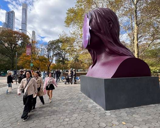 November 6, 2025, New York, New York, USA: A view of the public sculpture First Sun by Kuwaiti artist Monira Al Qadiri seen on display in Central Park, at the Doris C. Freedman Plaza. The 17-foot-tall painted aluminum sculpture is inspired by the ancient Egyptian deity Khepri reimaged as a contemporary monument. New York USA - ZUMAk03_ 20251106_zaf_k03_057 Copyright: xNancyxKaszermanx