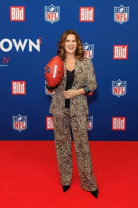 Empfang - BILD NFL TOUCHDOWN BERLIN - Katarina Witt beim BILD TOUCHDOWN BERLIN National Football League - Empfang, anlässlich des ersten regulären Saisonspiels der NFL Teams Indianapolis Colts vs. Atlanta Falcons am 07.11.2025 im Axel-Springer-Hochhaus in Berlin. Copyright: xEventpressxKochanx