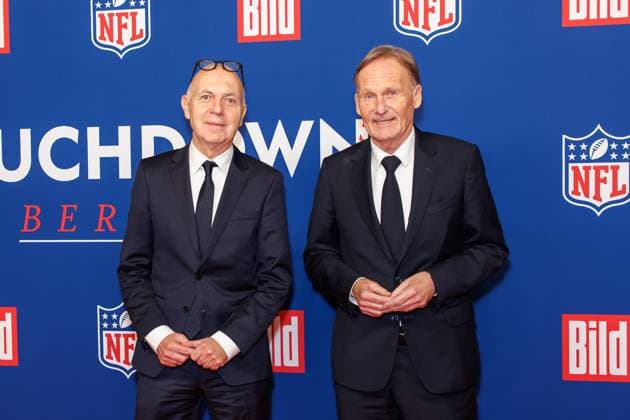 Empfang - BILD NFL TOUCHDOWN BERLIN - Bernd Neuendorf und Hans-Joachim Watzke beim BILD TOUCHDOWN BERLIN National Football League - Empfang, anlässlich des ersten regulären Saisonspiels der NFL Teams Indianapolis Colts vs. Atlanta Falcons am 07.11.2025 im Axel-Springer-Hochhaus in Berlin. Copyright: xEventpressxKochanx
