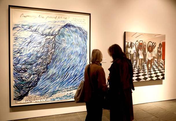 November 7, 2025, New York, New York, USA: Two women seen with No Title (Preparing the Ground) by artist Raymond Pettibon, estimate $1 million -$ 1.5 million during November Marquee Week 2025 during SothebyÃ¢â‚¬â ¢s Opening of the New Global Headquarters at the Breuer. New York USA - ZUMAk03_ 20251107_zaf_k03_055 Copyright: xNancyxKaszermanx