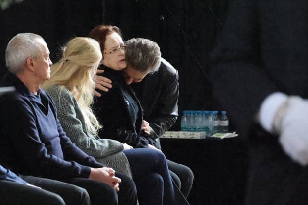 RUSSIA, MOSCOW - NOVEMBER 8, 2025: Singer Valery Syutkin (R) hugs widow Eleonora Nikolayeva (C) during a farewell ceremony for the late Soviet and Russian TV host and actor Yuri Nikolayev at the Troyekurovo funeral home. Yuri Nikolayev passed away on 4 November 2025 at the age of 76 Moscow Russia  - ZUMAt113 20251108_zaa_t113_134 Copyright: xVladimirxGerdox