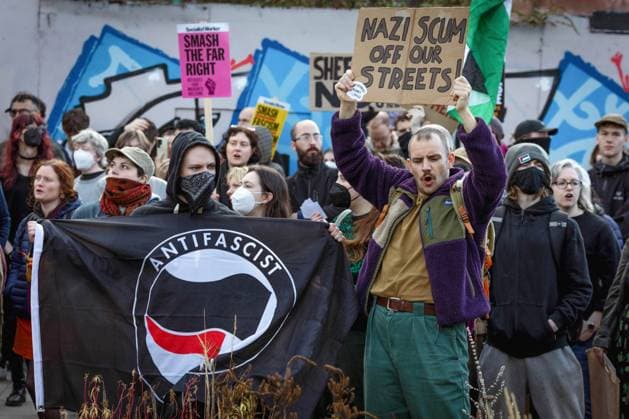 November 8, 2025, Sheffield, United Kingdom: Protesters hold a banner and placards during the demonstration. Stand Up to Racism took to the streets to counter-protest UKIP. UK Independence Party leader Nick Tenconi marched through the city for the latest leg of The Mass Deportations Tour, which wants to see the end of illegal immigration. Sheffield United Kingdom - ZUMAs197 20251108_aaa_s197_124 Copyright: xAndyxBartonx