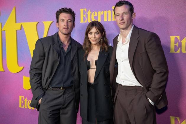 November 8, 2025, Bronx, New York, USA: Miles Teller, Elizabeth Olsen and Callum Turner attend Eternity premiere at Regal Union Square in New York, NY on November 8, 2025. Bronx USA - ZUMAr339 20251108_znp_r339_061 Copyright: xLevxRadinx