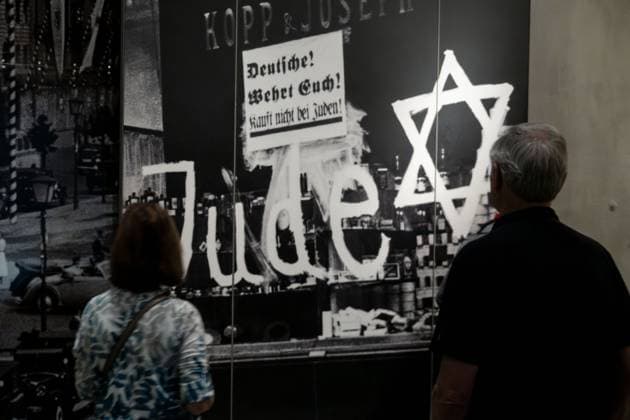 November 9, 2025: Visitors walk past exhibits detailing the coordinated attacks of Kristallnacht, the Night of Broken Glass at the Yad Vashem Holocaust Museum in Jerusalem. The 87th anniversary of Kristallnacht, commemorated today, serves as a powerful and timely reminder of the dangers of unchecked hatred. The solemn viewing comes amid an unprecedented global surge in antisemitism over the past two years since the start of the Israel-Hamas War, with anti Jewish incidents spiking dramatically in major cities like New York, London, Paris, Berlin, and Sydney. - ZUMAa126 20251109_zap_a126_001 Copyright: xNirxAlonx