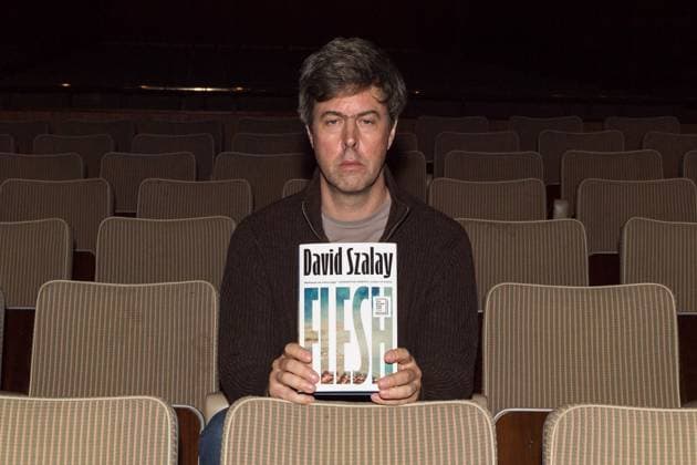 November 9, 2025, London, England, United Kingdom: Hungarian-British author DAVID SZALAY poses with his book Ã¢â‚¬ËœFleshÃ¢â‚¬â ¢ shortlisted for the Booker Prize 2025 during a photocall ahead of a reading event at Southbank Centre. The winner of the Booker Prize 2025 will be announced on Monday, 10 November at a ceremony in London, and the winning author will receive Ã‚Â£50,000. London United Kingdom - ZUMAs371 20251109_zip_s371_134 Copyright: xWiktorxSzymanowiczx