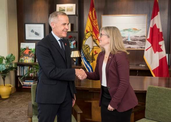 November 10, 2025, Fredericton, Nb, Canada: Prime Minister Mark Carney left, meets with New Brunswick Premier Susan Holt in her office in Fredericton, N.B., on Monday, Nov. 10, 2025. Fredericton Canada  - ZUMAc35_ 20251110_zaf_c35_049 Copyright: xStephenxMacgillivrayx