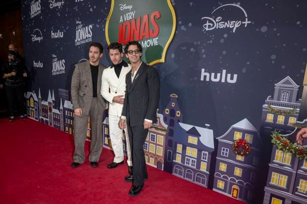November 10, 2025, New York, United States: (L-R) Kevin Jonas, Nick Jonas and Joe Jonas attend Disney+ s A Very Jonas Christmas Movie New York Premiere at New York City Center. New York United States - ZUMAs197 20251110_aaa_s197_428 Copyright: xRonxAdarx