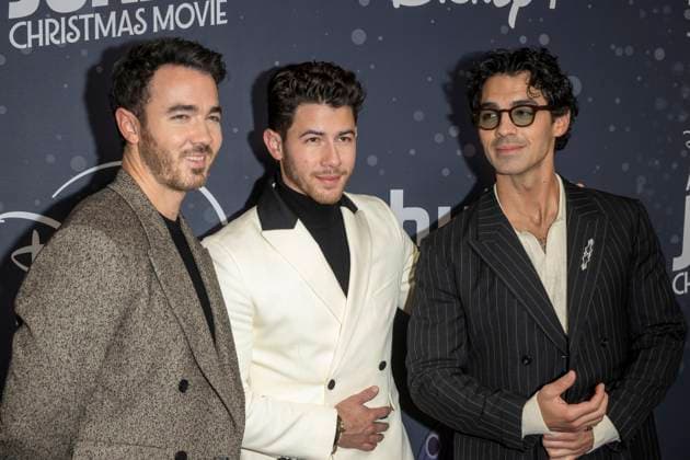 November 10, 2025, New York, United States: (L-R) Kevin Jonas, Nick Jonas and Joe Jonas attend Disney+ s A Very Jonas Christmas Movie New York Premiere at New York City Center. New York United States - ZUMAs197 20251110_aaa_s197_429 Copyright: xRonxAdarx