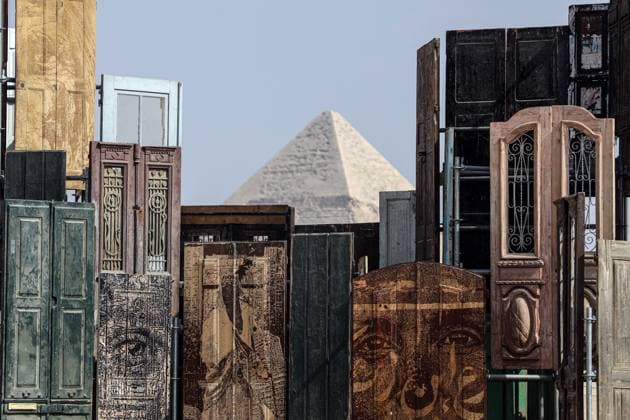 (251111) -- CAIRO, Nov. 11, 2025 -- An artistic installation is displayed during the Forever Is Now international art exhibition at Giza Pyramids scenic spot in Giza, Egypt, Nov. 11, 2025. The fifth edition of Forever Is Now international art exhibition on Tuesday kicked off in the area of Egypt s Giza Pyramids scenic spot, showcasing 10 artworks of artists from different countries. The exhibition runs from Nov. 11 to Dec. 6. Ahmed Gomaa) EGYPT-GIZA-PYRAMIDS-ART EXHIBITION-FOREVER IS NOW AixHamaide¡¤gema 