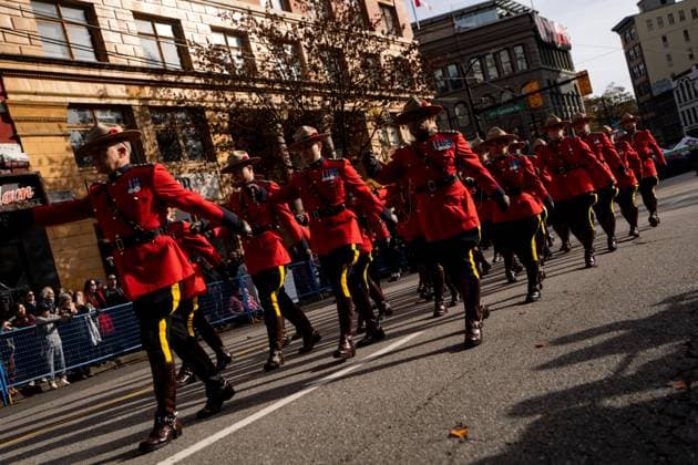 November 11, 2025, Vancouver, Bc, CANADA: RCMP constables march during a Remembrance Day ceremony, in Vancouver, B.C., Tuesday, Nov. 11, 2025. Vancouver CANADA  - ZUMAc35_ 20251111_zaf_c35_236 Copyright: xEthanxCairnsx