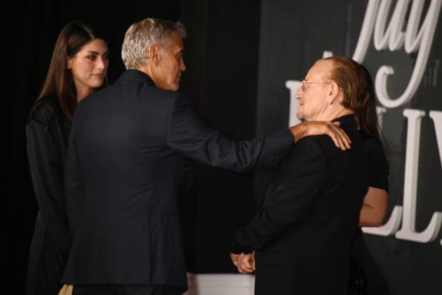 LOS ANGELES, CA- NOVEMBER 11: George Clooney and Bono at the Los Angeles premiere of Netflix s Jay Kelly at The Egyptian Theatre Hollywood on November 11, 2025 in Los Angeles, California. Copyright: xJeffreyxMayerx