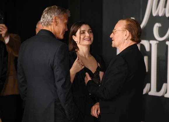 LOS ANGELES, CA- NOVEMBER 11: George Clooney, Eve Hewson and Bono at the Los Angeles premiere of Netflix s Jay Kelly at The Egyptian Theatre Hollywood on November 11, 2025 in Los Angeles, California. Copyright: xJeffreyxMayerx