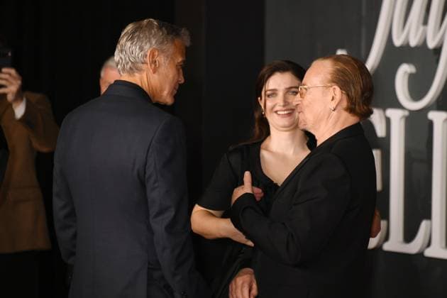 LOS ANGELES, CA- NOVEMBER 11: George Clooney, Eve Hewson and Bono at the Los Angeles premiere of Netflix s Jay Kelly at The Egyptian Theatre Hollywood on November 11, 2025 in Los Angeles, California. Copyright: xJeffreyxMayerx