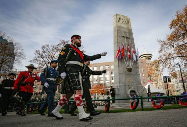 (251111) -- VANCOUVER, Nov. 11, 2025 -- Vigil guards march in front of the Victory Square Cenotaph during a Remembrance Day ceremony in Vancouver, British Columbia, Canada, Nov. 11, 2025. (Photo by Liang Sen Xinhua) CANADA-VANCOUVER-REMEMBRANCE DAY LinxWei 