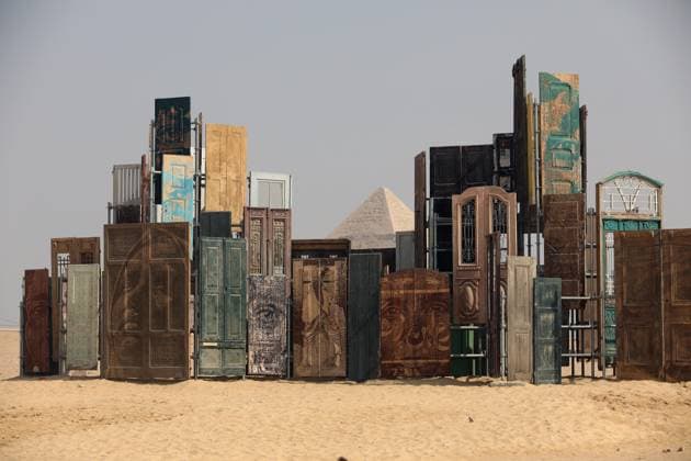 Giza Pyramids, a backdrop for Forever Is Now contemporary art exhibition in EgyptGiza Pyramids, a backdrop for Forever Is Now contemporary art exhibition in Egypt A view of the art installation Doors of Cairo by artist Alexandre Farto from Portugal during the fifth edition of the Forever is Now art exhibition by Art d’Egypte at the Giza pyramids necropolis, Egypt on November 11, 2025. Art D’Égypte, this global art exhibition is a one-of-a-kind event that bridges the brilliance of contemporary art with the grandeur of Egypt’s ancient heritage, showcasing how art interacts with time and place at one of the world’s most iconic heritage sites. This year’s fifth edition features a diverse group of international ten artists from different  Copyright: xMatrixxImagesx xKhaledxElfiqix