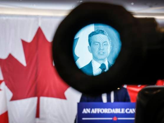 November 12, 2025, Calgary, Ab, CANADA: Conservative leader Pierre Poilievre is seen in the viewfinder of a television camera while speaking at a news conference in Calgary, on Wednesday, Nov. 12, 2025. Calgary CANADA  - ZUMAc35_ 20251112_zaf_c35_061 Copyright: xJeffxMcintoshx