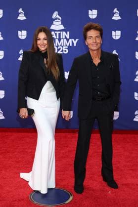 (L-R) Daisy Fuentes and Richard Marx arrive for the 26th annual Latin Grammy Awards at the MGM Garden Arena in Las Vegas, Nevada on Thursday, November 13, 2025.  LAV20251113138 JAMESxATOA