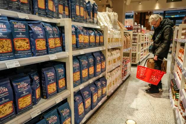 a taste of Italy at Eataly Shoppers browse pasta and other comestibles imported from Italy at the specialty store, Eataly in New York on Thursday, November 13, 2025. The Trump administrationÕs Commerce Dept. has proposed a 107% tariff on Italian pasta, including a 92% anti-dumping import duty. (  RichardxB.xLevine