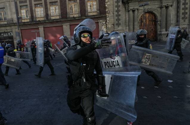 Gen Z Protest Against Mexico s Government Police during the ˜Gen Z™ demonstration at main square Zocalo against the Mexican government following the murder of Uruapan Mayor Carlos Manzola, while Mexico s President, Claudia Sheinbaum, has questioned the legitimacy of the movement in recent days . on November 15, 2025 in Mexico City, Mexico. (Photo by Ian Robles Eyepix Group) Copyright: xIanxRoblesx xEyepixxGroupx EL_15112025_173198JPEG