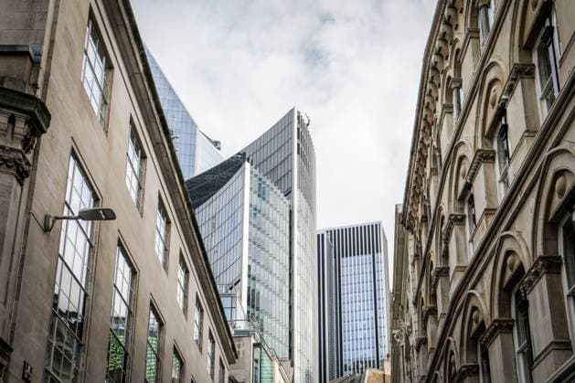Modern Glass Skyscrapers and Historic Architecture in City Center. Copyright: xEdgarsxSermulisx