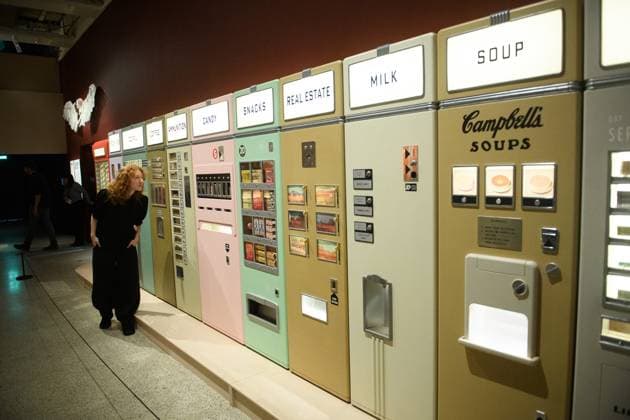 Wes Anderson: The Archives Press Preview at Design Museum, London, UK A staff member views A bank of Vending Machines created for Asteroid City by Atelier Simon Weisse and Erica Dorn (2021) at a photocall for The Design Museum s Wes Anderson: The Archives Exhibition at The Design Museum in London, England, UK on Monday 17 November 2025. The exhibition runs from 21 November 2025 - 26 July 2026., Credit:Justin Ng Avalon UK, England, London, Design Museum  Copyright: xJustinxNgx xAvalonx 1052941801